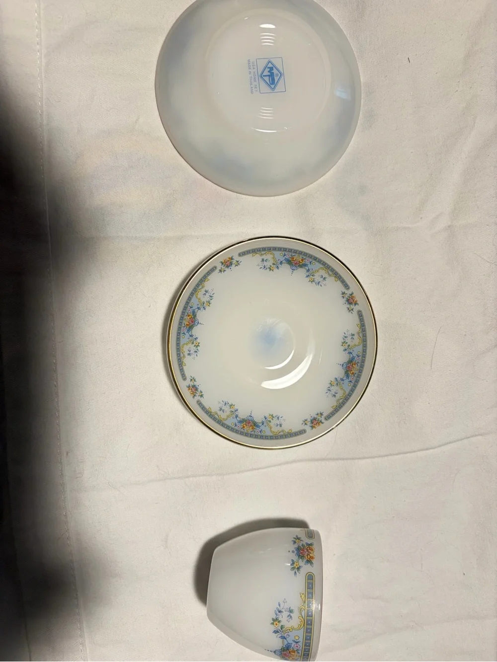 Porcelain Teacup and Saucer Set in White with Blue Floral Trim